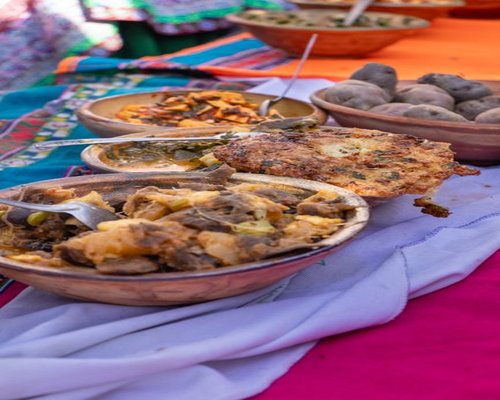 A simple homemade meal with local Peruvian ingredients on a rustic wooden table